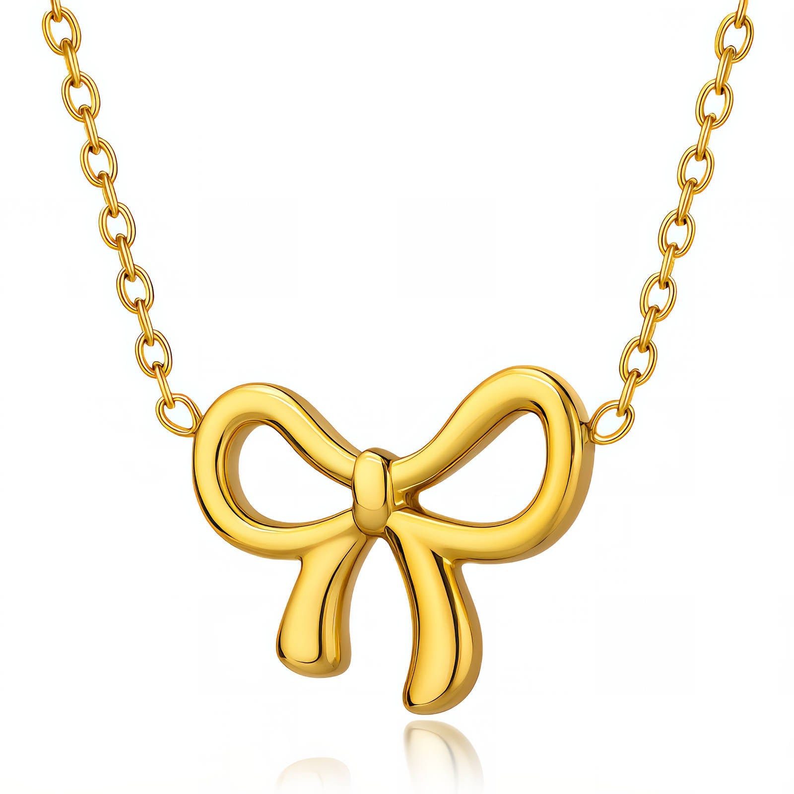 Gold bow necklace on a white background